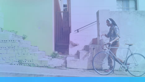 animación de formas que se mueven sobre un hombre afroamericano caminando en bicicleta