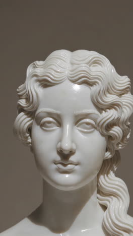 white marble bust of a woman