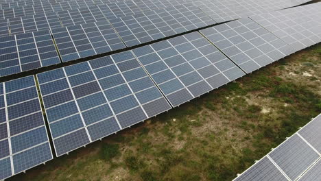 Close-aerial-shot-of-a-photovoltaic-power-station.-Solar-park-France