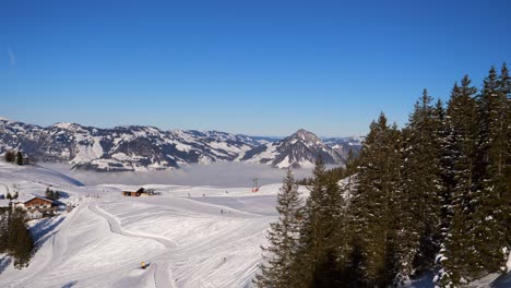 ski area in the swiss alps with people and chairlifts in the winter ski area of beckenried