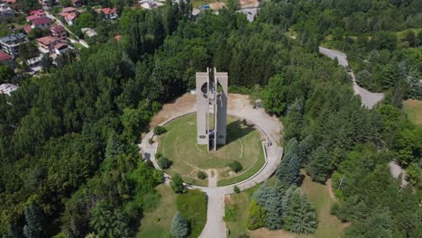 aerial drone view of tall, concrete the bells monument in sofia, bulgaria