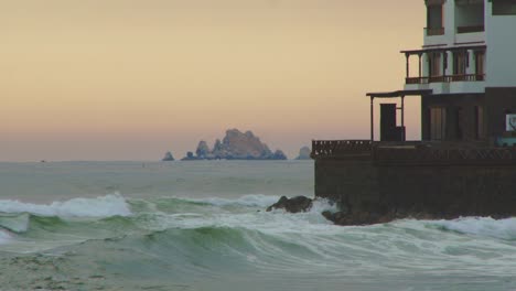 Oceanside-Home,-Island-And-Waves-El-Silencio,-Punta-Hermosa,-Peru-4k