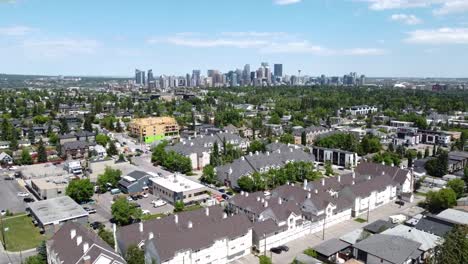 drone flying towards the city of calgary on a sunny summer day