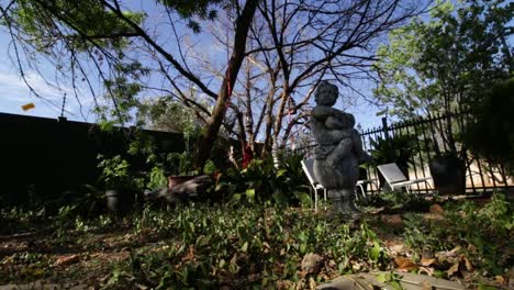 concrete statue in garden
