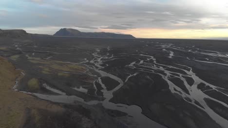 aerial establishing shot of glacial rivers