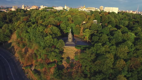 Aerial-view-monument-Prince-Vladimir-in-summer-park-on-in-Kiev-city-landscape.