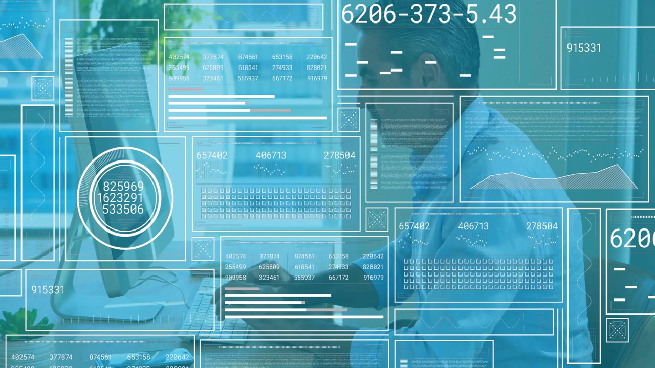 Data analyst typing at office desk triggers live finance dashboards updating before calling client