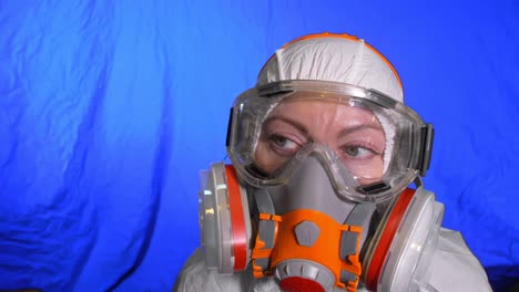 scientist virologist in respirator. woman close up look, wearing protective medical mask. concept health safety n1h1 coronavirus epidemic 2019 ncov.