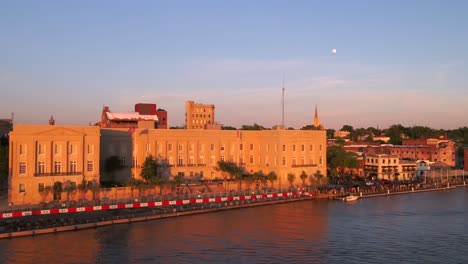 Droning-over-Cape-Fear-River-in-the-historic-town-of-Wilmington,-North-Carolina