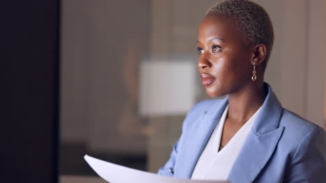 Documents,-business-and-black-woman-working