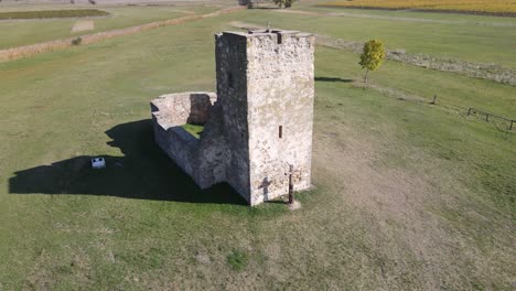 Aerial-rising-view-of-Soltszentimre-Truncated-Tower,-Hungary