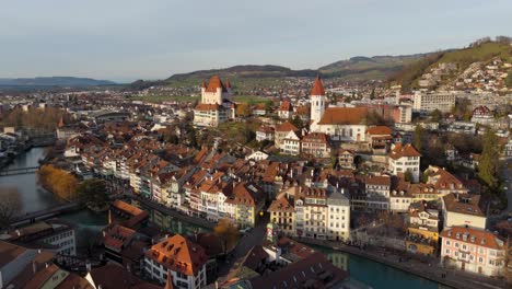 picturesque historical thun town and river aare flowing in center