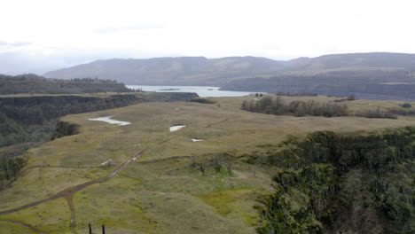 expansive overcast landscape of a river gorge and plateau