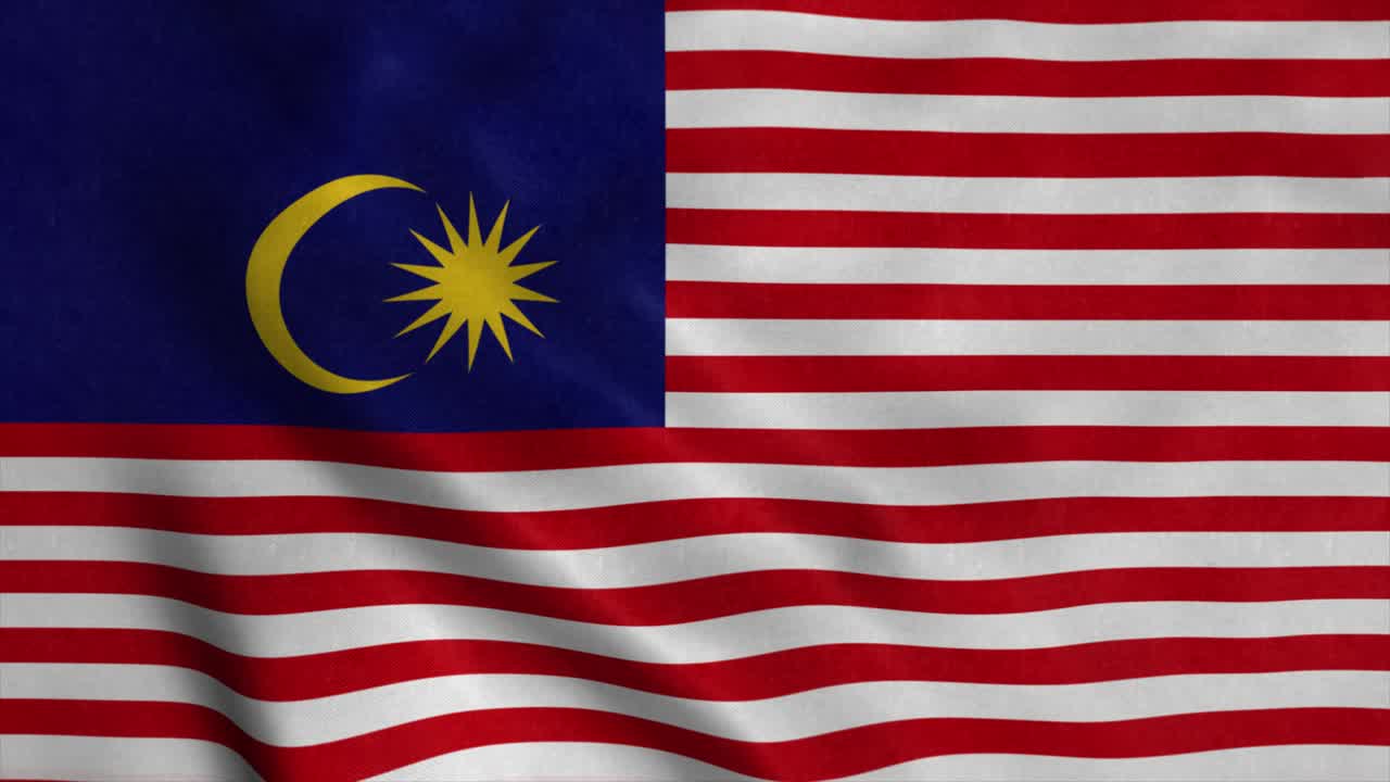 La bandiera nazionale della Malesia sventola al vento. 4K.