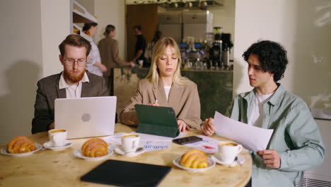 business partners having a meeting in a cafe