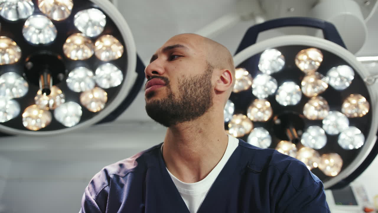 Focused surgeon in operating room