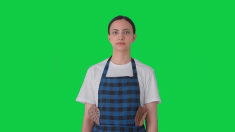 indian housewife looking to the camera green screen