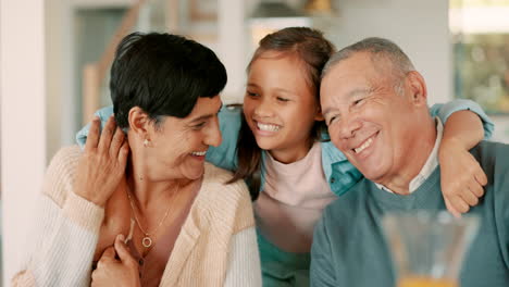 Grandparents,-smile-and-hug-girl-in-home