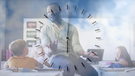 animation of clock and clouds over happy african american male teacher addressing pupils in class