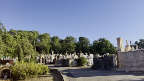 old cemetery with large gravestones in the sun