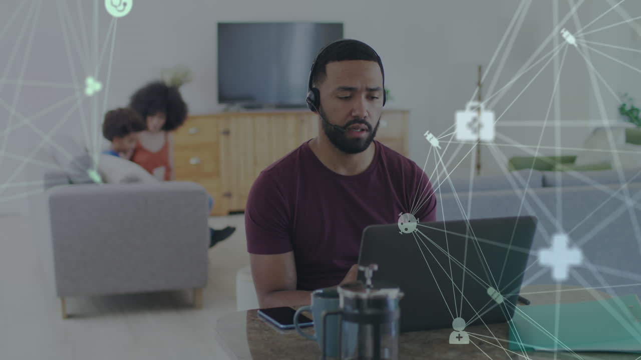 Animation of network of connections over man using laptop