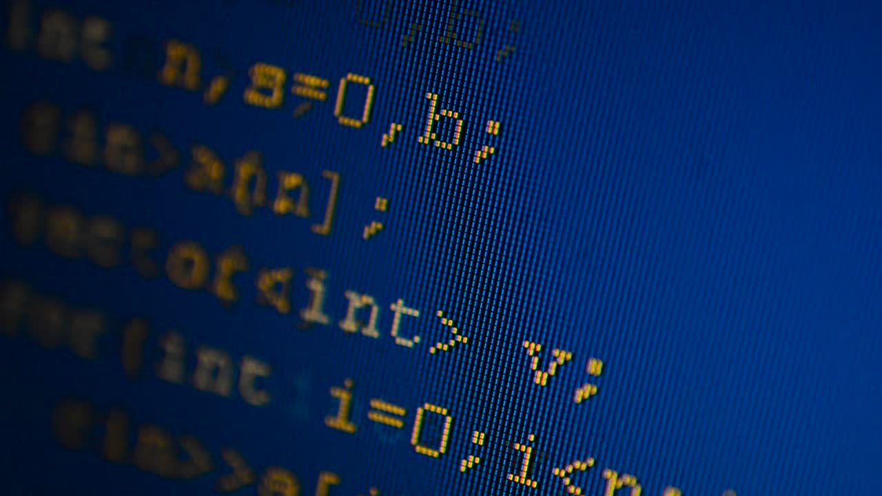 Source code on the monitor screen. Source code