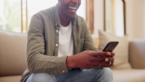 Happy-man,-hands-and-phone-typing-on-sofa