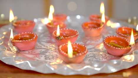 diwali festival preparations, burning earthen lamps