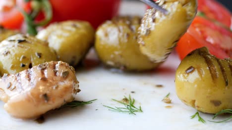 turkish grilled olives with olive and tomato on plate ,