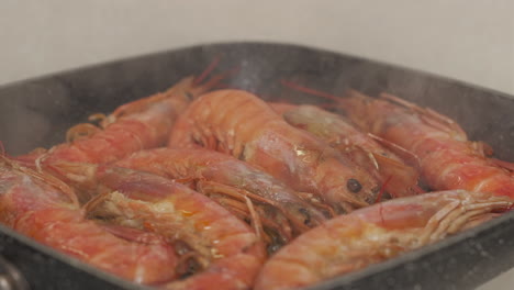 cooking argentinian red shrimps on pan sea food