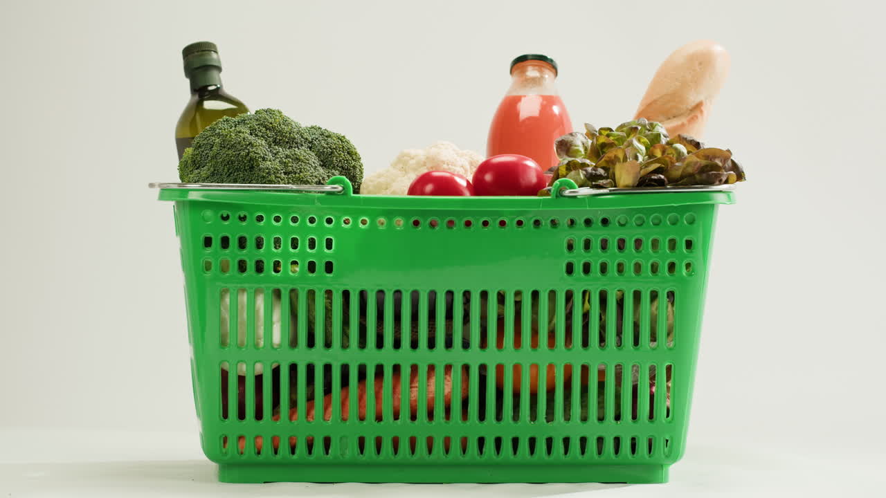 Shopping Basket Filled with Fresh Produce and Juice