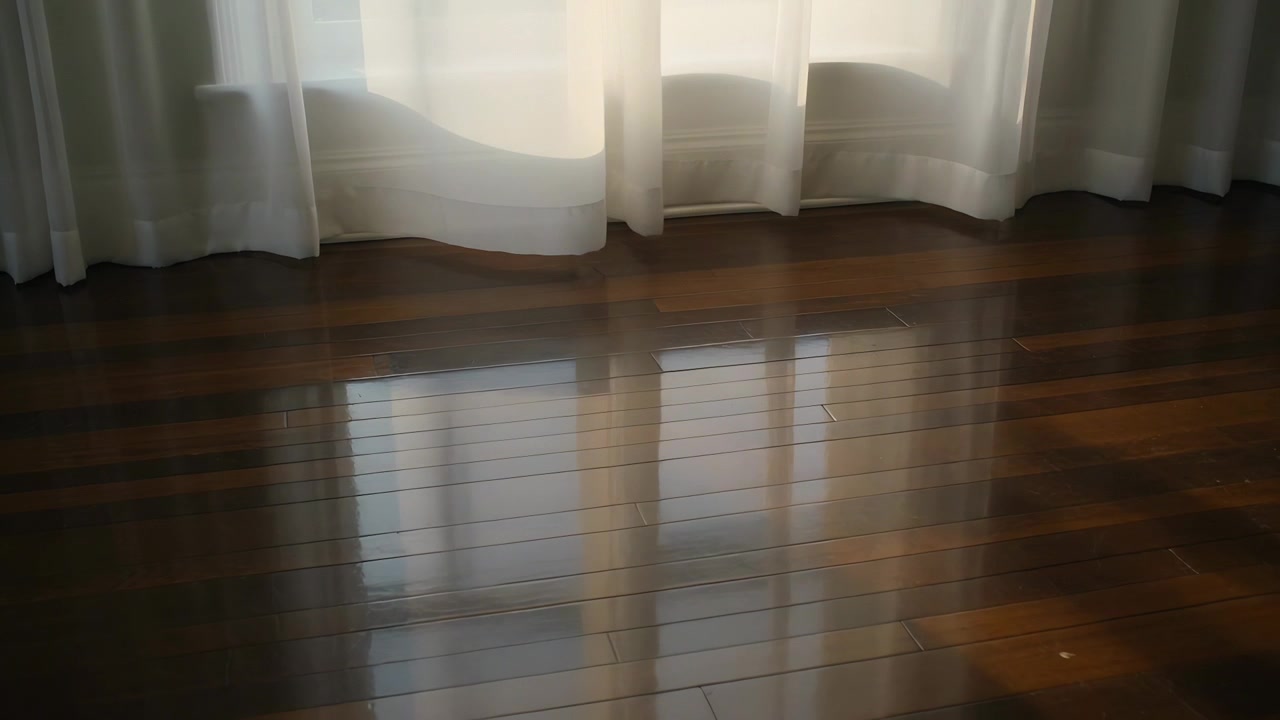 Daylight filtering through window at home making sheer white curtain swaying on wood floor, heater