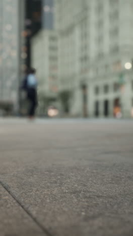 a close-up of a concrete sidewalk in a city