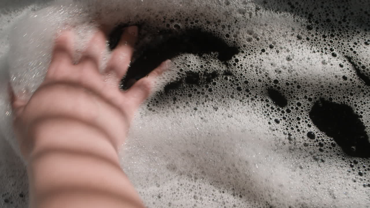 Washing something with soap and water