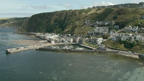 Aerial-view-of-the-Gardenstown-on-the-Aberdeenshire-coastline-on-a-summer-day