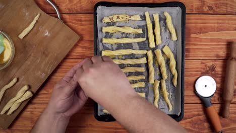 Putting-seeds-under-the-baked-rolled-dough