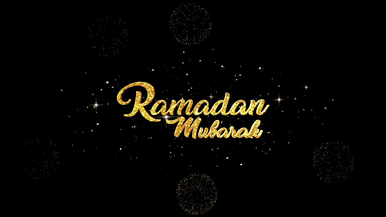 Ramadan Kareem (Eid Mubarak) Bellissimo testo di auguri dorato che appare da particelle lampeggianti con sfondo di fuochi d'artificio dorati.
