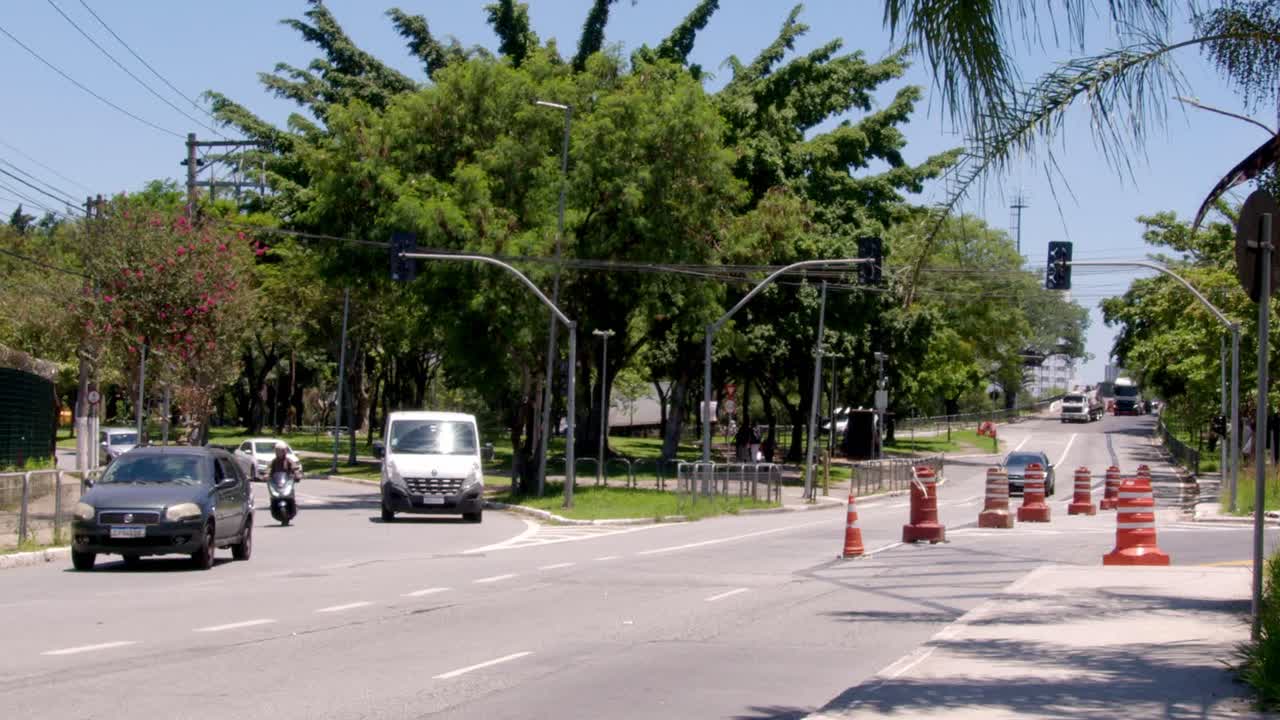 City Street Scene with Ambulance and Road Construction