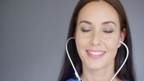 First-person-view-of-doctor-using-stethoscope