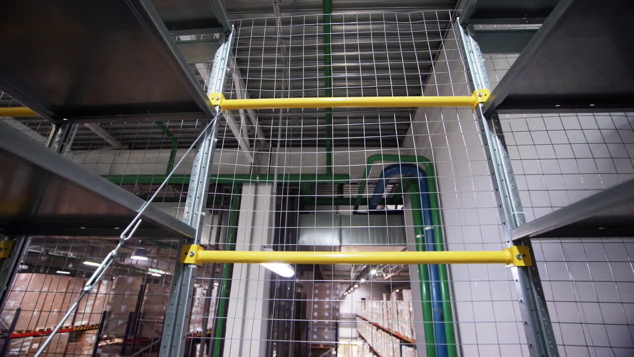 Warehouse Interior with High Shelves and Storage Racks