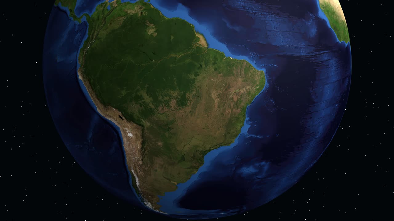 Il globo digitale ruota e ingrandisce sul Sud America, evidenziando Arica con un pannello dati informativo
