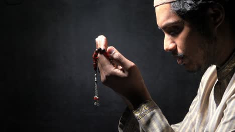 muslim man praying during ramadan at night