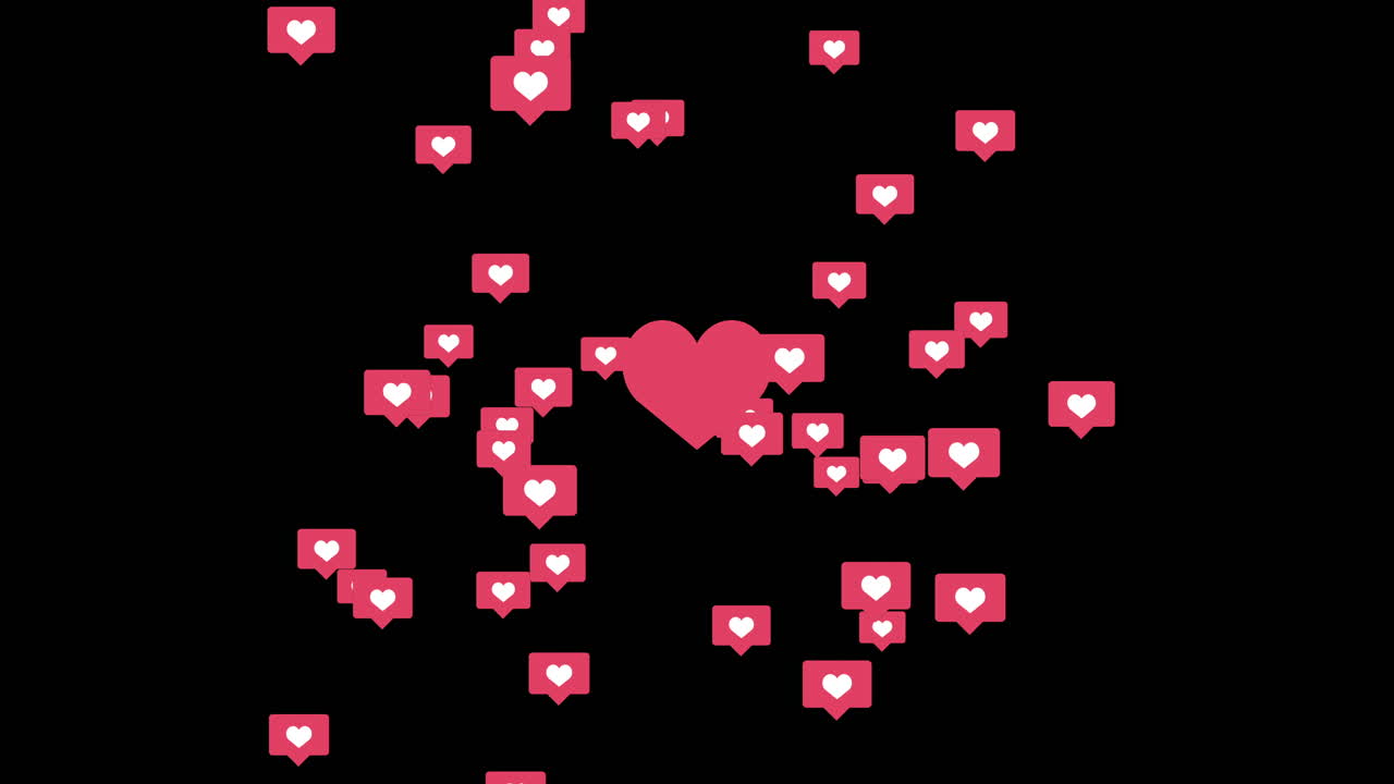 Red heart with flying small icons for social networks on a black background. Animation overlay background. Like sign.