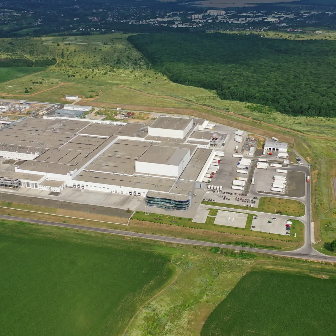 Aerial view of a modern industrial plant. Modern Factory Exterior.