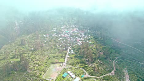 Drone-shot:-Tapay-emerges-from-the-clouds