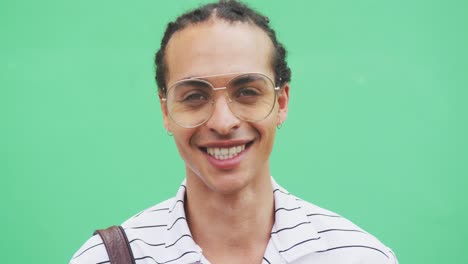 Mixed-race-man-smiling-at-the-camera