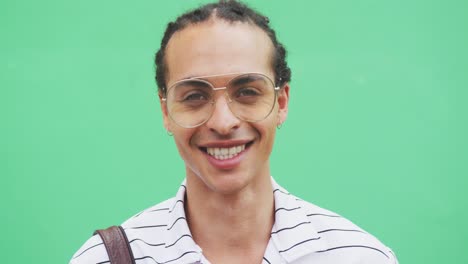 mixed race man smiling at the camera
