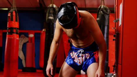 male boxer wearing headgear