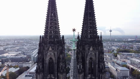 drone flight past star of bethlehem on cologne cathedral crossing tower, germany