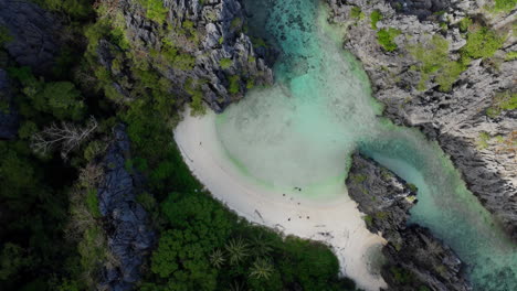 orbit shot shot of hidden beach in el nido, palawan